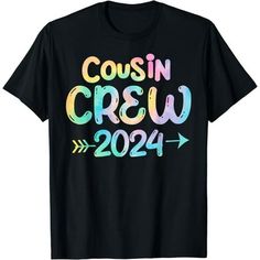 a black t - shirt with the words cousin crew in multicolored letters