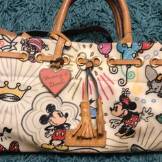 Vintage Very Rare Walt Disney Dooney & Bourke Bag In Used Condition. Everything About The Purse Is Excellent, Just Needs To Be Cleaned. Disney Dooney, Dooney & Bourke Bag, Bags Vintage, Dooney & Bourke Bags, Dooney Bourke, Very Rare, Walt Disney, Crossbody Bags, Bag Lady