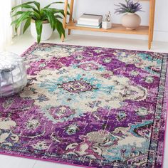 an area rug with purple and blue colors