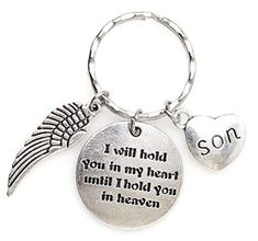 a keychain with an angel wing and i will hold you in my heart