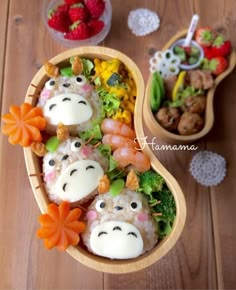 a wooden bowl filled with sushi and vegetables