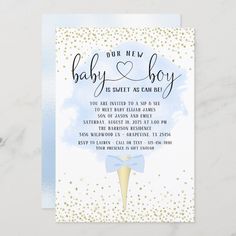 a baby shower is shown with gold confetti and blue watercolors on it