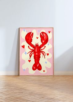 a red lobster with hearts on it's chest in front of a white wall