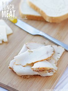 slices of bread and cheese on a cutting board