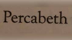 the word percabeth written in black ink