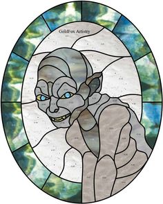 a stained glass window with an image of a creature