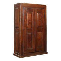 an old wooden armoire with two doors