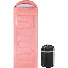 an inflatable sleeping bag next to a travel bag