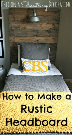 a bed that has been made with yellow and gray blankets on it, in front of a wooden headboard