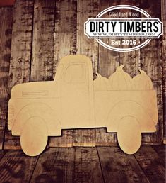 a wooden cutout of a truck with the words dirty timers on it