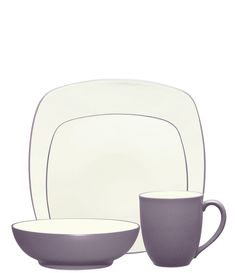 a white and grey dinner set with two cups