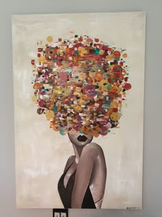 a painting with many circles on it and a woman's head