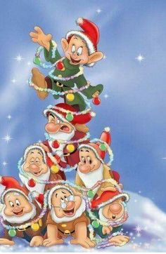 an animated christmas tree with many dwarfs around it