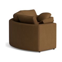 a brown couch sitting on top of a white floor