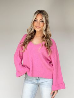 This Delightful Knit Sweater is the perfect addition to your wardrobe. Featuring a v neckline and ribbed detailing, this garment is luxuriously crafted with textured ultra-stretchy softness. Noticeably bright, cozy and relaxed fit, with bell sleeves, this sweater is perfect for an elevated casual brunch date, shopping, dinner, or work wear. Classy and sophisticated, it is a timelessly versatile piece. 50% Acrylic 30% Nylon 20% Cotton Hand wash cold. Solid Ribbed V-neck Knit Top, Trendy Ribbed V-neck Cardigan, Spring V-neck Soft Knit Stretch Sweater, Stretch Ribbed V-neck Sweater, Chic Soft Knit V-neck Sweater, Soft Knit V-neck Sweater For Spring, Pink Textured Knit V-neck Sweater, V-neck Ribbed Sweater For Layering, Stretch V-neck Sweater With Ribbed Neckline