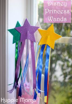 there is a window sill decorated with stars and streamers that say disney princess wands