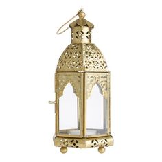 Cast a warm glow in your room with our beautifully handcrafted Latika candle lantern from India. Made of glass and metal with an antiquegold finish, this exquisite, petite lantern has a hinged door for easy access to the interior. We recommend grouping multiple lanterns together on or above a buffet or accent table for a sublime boho take on Moroccan-style decor. Moody Cottage, Goddess Of Life, Persephone Goddess, Hanging Candle Lanterns, Women's Retreat, Gold Lanterns, Embossed Printing, Hanging Candles, Healing Space