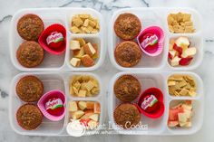 several plastic containers filled with food on top of a marble countertop next to chips and apples