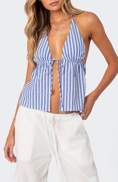 Cheery stripes and a sassy silhouette define a summery halter top cut from airy cotton. Front tie closure; ties at neck Plunge halter neck 100% cotton Machine wash, dry flat Imported Chic Striped Top For Vacation, Striped Halter Neck Top For Spring, Spring Vacation Striped Halter Top, White Vertical Stripes Top For Beach, Summer Striped Tops For Beach, Striped Summer Tops For The Beach, Chic Beach Tops With Vertical Stripes, Summer Striped Tops For The Beach, White Summer Tops With Vertical Stripes