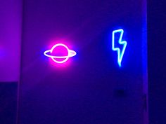 two neon signs that are on the wall