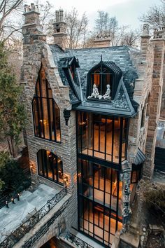 an aerial view of a house with lots of windows