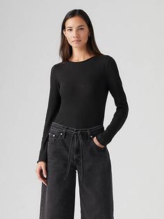 We love a simple, flattering long-sleeve tee like our Lightweight Slub Top. It features a boat neckline, a slim fit and textured fabric. A simple, flattering long-sleeve tee Cut with a slim fit Features a boat neckline Crafted from lightweight slub fabric Black Levis, Shirt Blouses Tops, Boat Neckline, Textured Fabric, Love A, Levi's, Long Sleeve Tees, Womens Shirts, Slim Fit