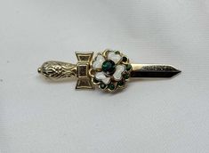 RARE Vintage Coro Signed Sword Brooch Pin With White Enamel Flower and Emerald Green Rhinestones - Etsy