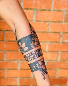 a person with a tattoo on their arm