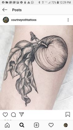 an apple tattoo on the left arm with leaves and flowers around it, in black and white