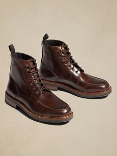 Rugged yet refined, this waxed calf-leather lace-up boot is mounted on a durable low profile lug rubber sole.  This pair features an apron style toe, with exposed antique brass eyelets and speed hooks, with a grosgrain pull tab.  Calfskin lined, this Light Brown Boots, Mens Brown Boots, Leather Work Boots, An Apron, Dress Boots, Leather Lace Up Boots, Brown Leather Boots, Leather Lace, Dr. Martens Boots