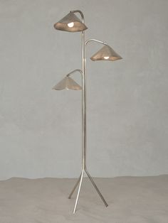 three light floor lamp with four lamps on each side and two lights at the top