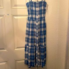 Never Worn Withtag Super Cute And In Excellent Condition. Summer Blue Plaid Dress With Tie Straps. Size Medium Casual Plaid Maxi Dress For Summer, Plaid Cotton Sundress For Vacation, Casual Plaid Cotton Sundress, Casual Plaid Sundress For The Beach, Casual Plaid Sundress For Beach, Plaid Cotton Beach Dresses, Cotton Plaid Dress For Beach, Casual Plaid Maxi Dress, Casual Cotton Maxi Dress For Daytime