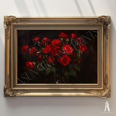 a painting of red roses in a gold frame