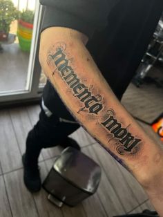 a person with a tattoo on their arm