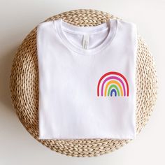 LITTLE RAINBOW BELLA+CANVAS UNISEX TEE **IMPORTANT** These are print-on-demand tees, so please keep in mind that they can take up to 7-10 business days to be fulfilled and 3-6 business days to be shipped.  Sometimes fulfillment can happen very quickly and sometimes longer than usual. The typical turnaround for production and shipping is 8-12 days. The Bella Canvas 3001 T-shirts are one of the most popular standard-weight unisex shirts in the world. They're made of ring-spun cotton which makes th Boho Rainbow Shirt Vinyl, Rainbow T-shirt, Rainbow Tshirt, Neutral Shirt, Cute Crewneck, Rainbow Tee, Love Tag, Boho Shirt, Cute Rainbow