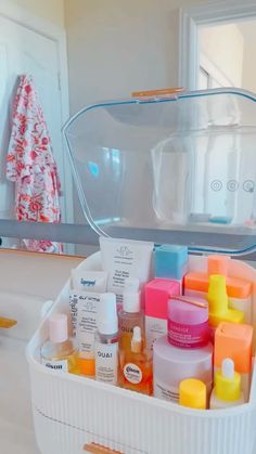 a white container filled with lots of beauty products