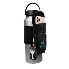 This water bottle holder makes keeping water on hand for hydration during exercise easier because it provides a place for your phone Printing Company Logo, 40 Oz Water Bottle, Water Bottle Organization, Bottle Caddy, Gym Water Bottle, Water Bottle Pouch, Yoga Beach, Print Company, Wide Mouth Water Bottle