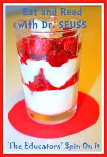 a red and white dessert in a glass with strawberries on the bottom, text reads eat and read with dr seuss