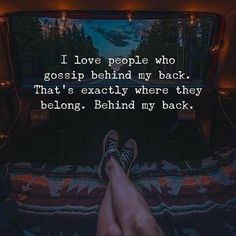 someone is laying down in bed with their feet up and the words i love people who gossip behind my back that's exactly where they belong