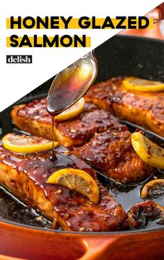 honey glazed salmon being cooked in a skillet