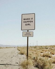 a sign that says make it happen girl and shock everyone on the side of the road