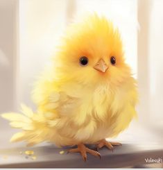 a small yellow chicken sitting on top of a table