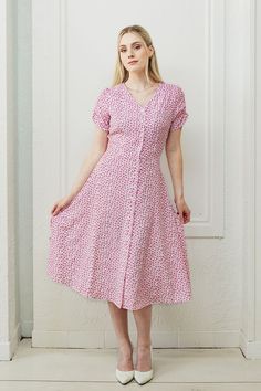 This everyday button-up dress is so easy to dress up or down. It has a flattering, modest v-neck and lovely sleeve ruching. The floral fabric is silky soft, very comfortable, and highly durable. Can be dressed up for a night on the town or an event, or dressed down for everyday style. We promise not to judge you if you wear this multiple times a week. All Poet dresses come with a cardstock poem delivered in a wax-sealed envelope. 🪶 Custom design by Poet Buttons up the front Midi-length skirt Ru Modest Birthday Dress, Peony Pink, Dresses Xxl, Midi Length Skirts, Button Up Dress, Birthday Dresses, Modest Dresses, Floral Fabric, Dressed Down