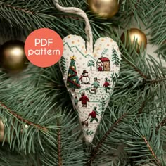 a christmas ornament hanging on a tree with the text pdf pattern above it