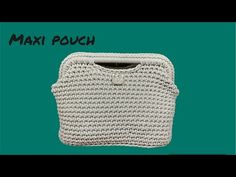 a white crocheted bag with the words'max pouch'written on it