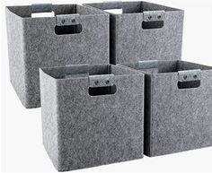 four grey felt storage bins with handles