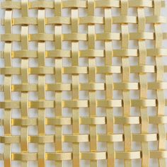 gold woven fabric with squares on it