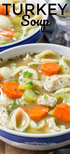 two bowls of turkey soup with carrots and celery