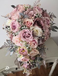 a bridal bouquet is sitting on a table