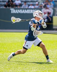 a lacrosse player in action on the field